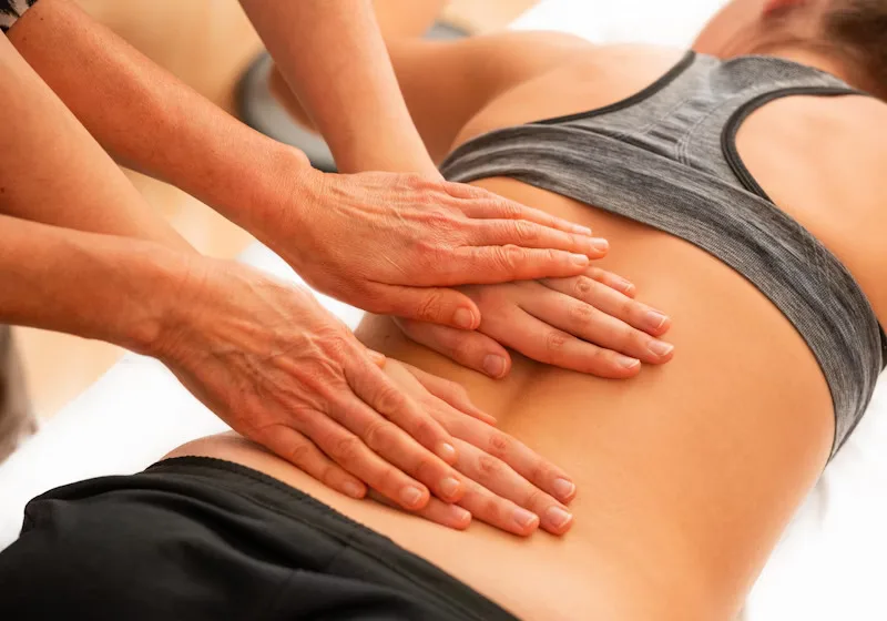 Relaxing massage room with essential oils and candles